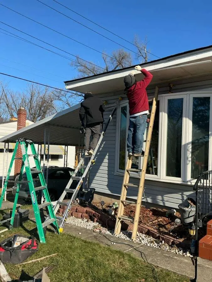 Restoration crew performing exterior repair in Walden